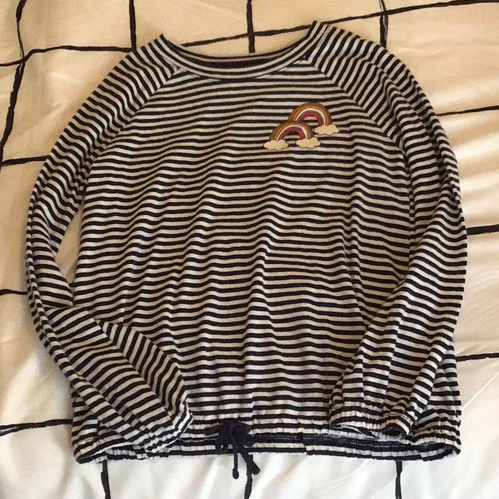 White with navy blue stripes. Rainbows